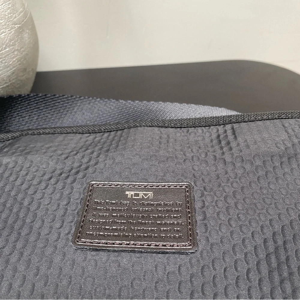 Tumi Glenview Expandable Crossbody Black and Dark Brown Messenger Bag